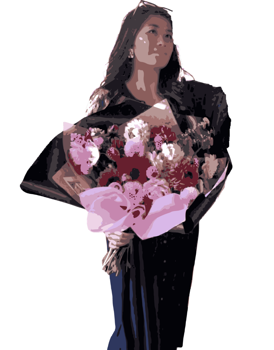 Mia holding a large bouquet of pink and burgundy dahlias.